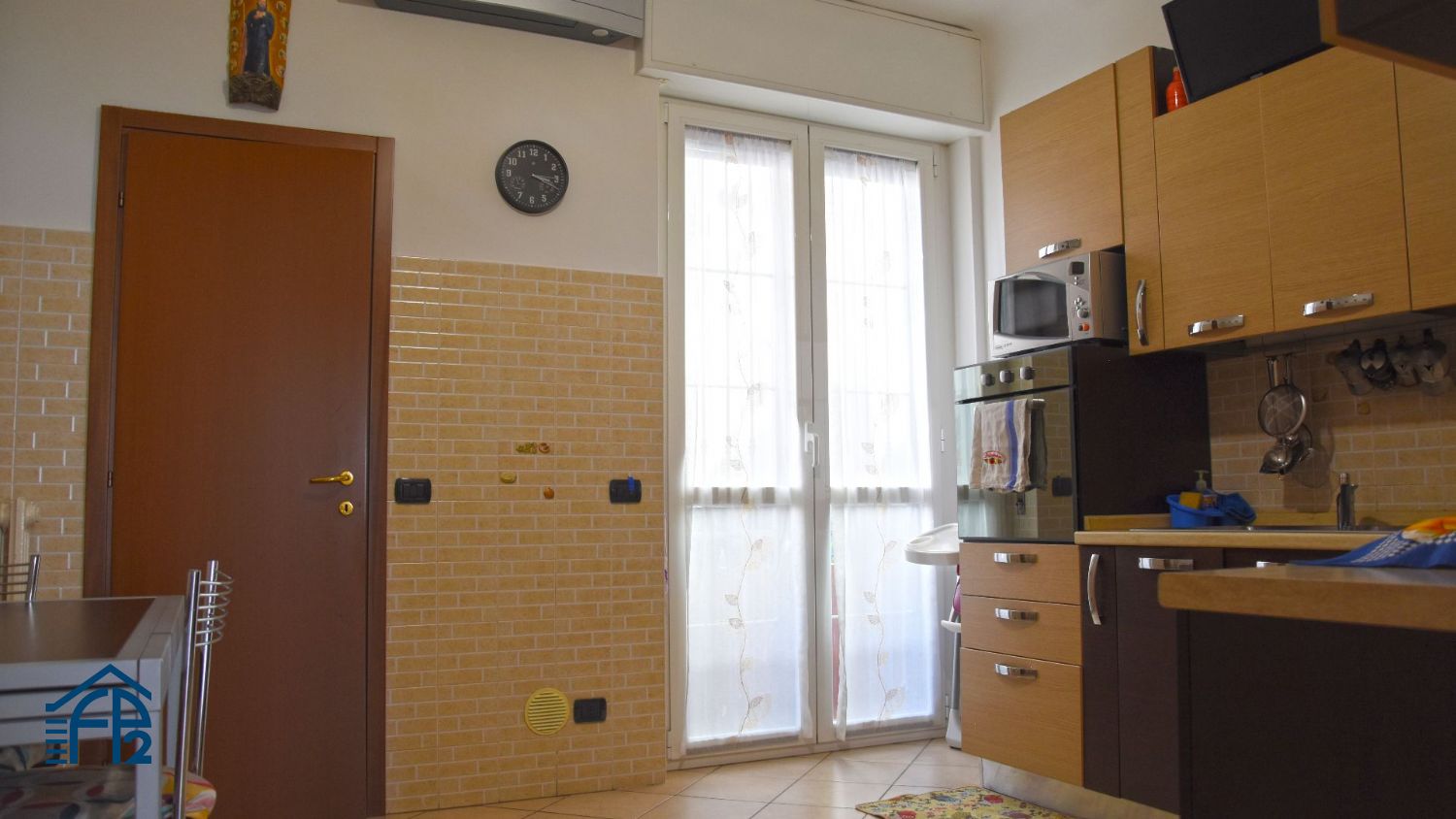 Trilocale con cucina abitabile