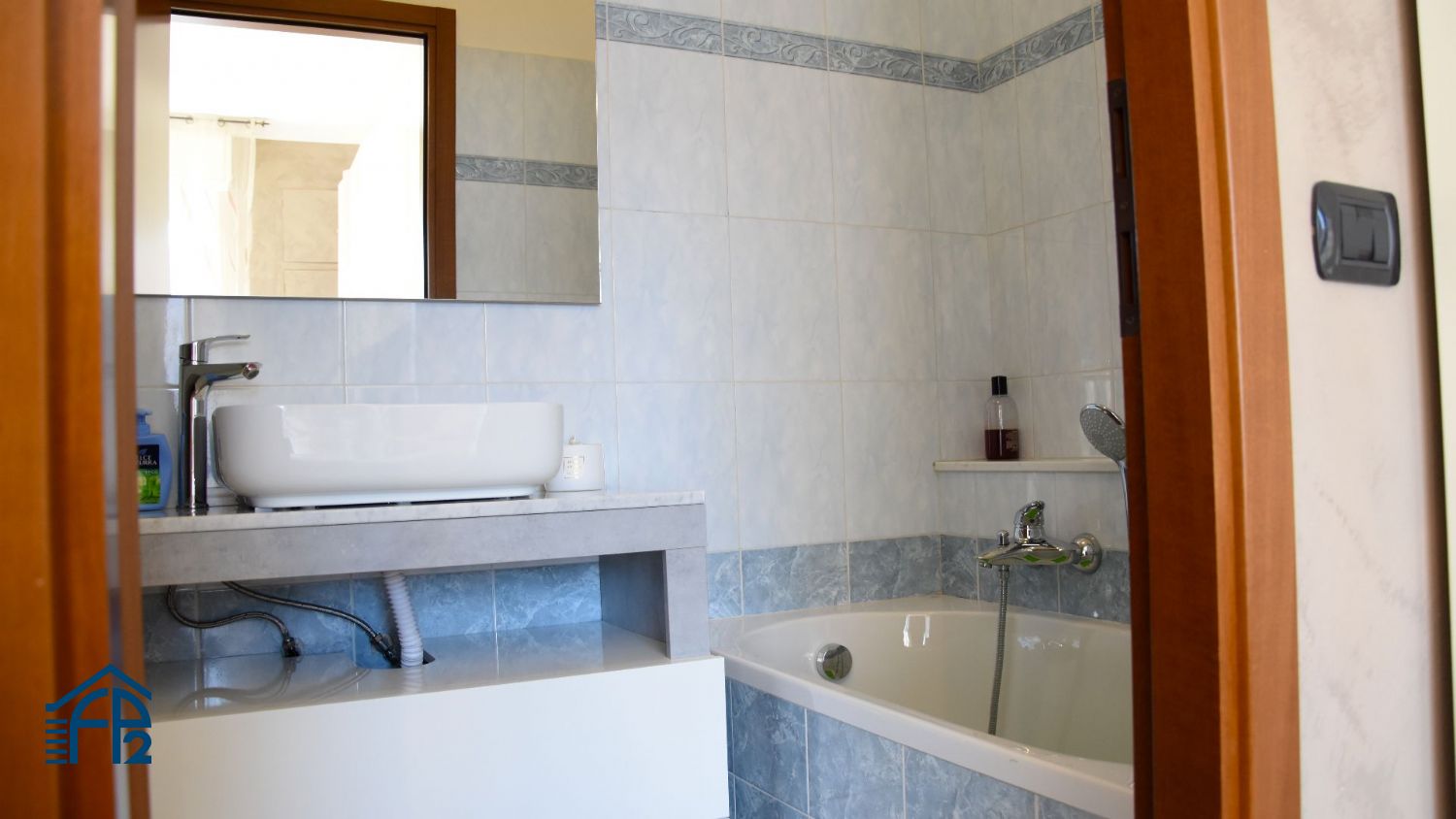 Trilocale con cucina abitabile
