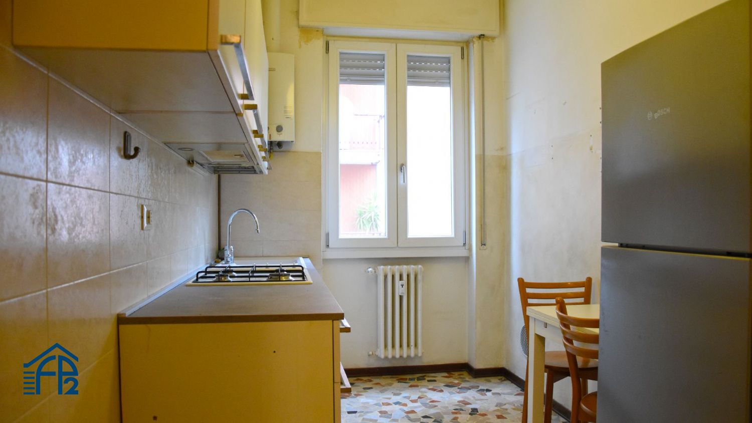 Trilocale con cucina abitabile